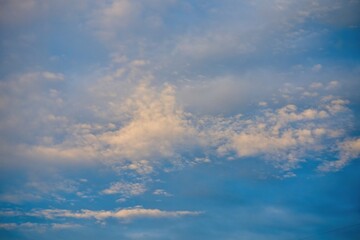 Beautiful cloudy sky. Small clouds on the blue sky.