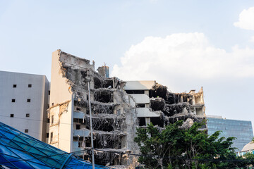 Building being Demolished - Broken Building in the middle of the city
