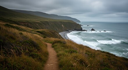 Coastal Hiking Trail Along California Cliffs with Overcast Sky and Ocean