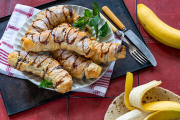 Bananas and chocolate spread baked in puff pastry
