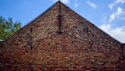  Curved brickwork. Brick wall.  Sunny.