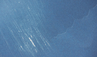 Texture of blue aged paper sheet, dirt stains, spots, wrinkle, grunge vintage background