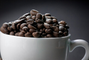 Close up of coffee beans are the background.