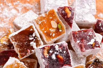 Sweet food Turkish delight, assorted rahat locum in form of cubes with nuts and powdered sugar, traditional food