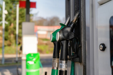 Fueling up car at modern gas station with diesel or petrol, capturing the essence of everyday...