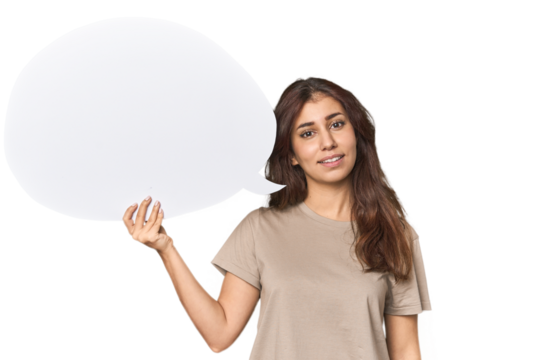 Middle Eastern woman holding comic bubble happy, smiling and cheerful.