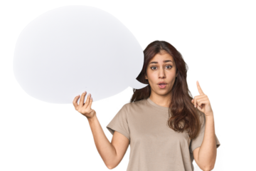 Middle Eastern woman holding comic bubble having an idea, inspiration concept.