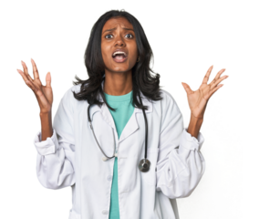 Young Indian doctor with stethoscope screaming to the sky, looking up, frustrated.