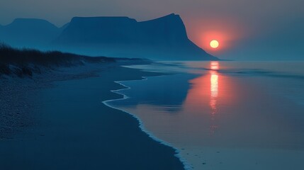 Fototapeta premium Serene sunset over a tranquil beach and reflecting mountains.