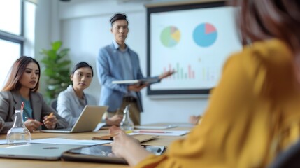 A consultant presenting recruitment strategies to a company's HR team.