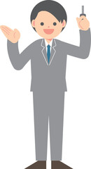 鍵を持つスーツの男性