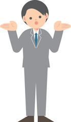 首を傾げるスーツの男性