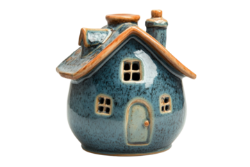 A ceramic house on black