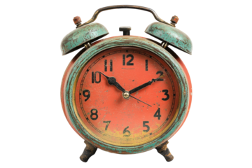 Old red alarm clock close up