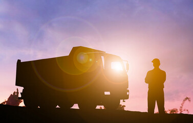 Truck Driver and Transport Truck at Sunrise