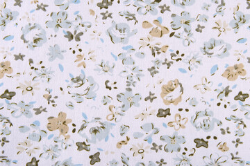 cotton white fabric with plant floral print in pastel colors close up