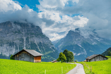 View on the alpine valley Grindelwald. Jungfrau, Switzerland. Under the Bernese alps. Mountain village.