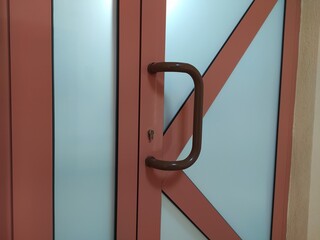 door handle in a room with colored walls