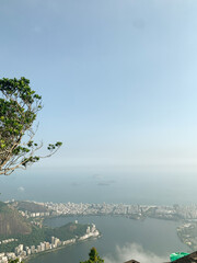 A breathtaking panoramic view of Rio de Janeiro unfolds from above,