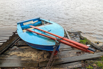 boat on the bank of a big river