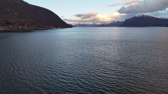 Aerial view of Sulafjorden's calm waters between the islands of Hareid and Sula at dawn