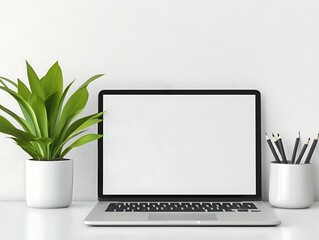 Fototapeta premium Minimalist Workspace: A modern laptop rests on a clean desk beside a vibrant plant and a sleek pencil holder, creating a fresh and functional workspace. 