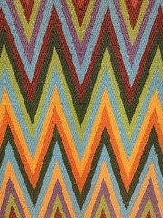 Vibrant zigzag textile pattern with colorful chevron stripes, ideal for fabric design, home decor...