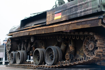 Military tank displayed at an outdoor exhibit showcasing historical vehicles from various nations and their contributions during conflicts