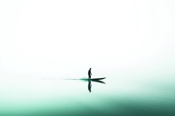 A lone figure stand-up paddleboarding on a calm, misty lake, serene and peaceful.