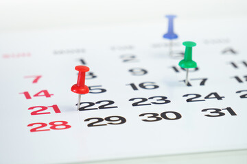 deadline concept with push pin on calendar date