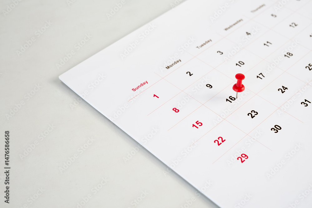 Poster deadline concept with push pin on calendar date