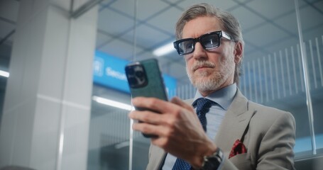 Airport Terminal: Successful Businessman Scanning Boarding Pass Using Smartphone, Checking Flight...
