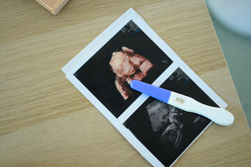 3D and 2D ultrasound pictures with a pregnancy test. Fetal development concept
