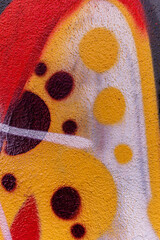 beautiful wallpaper of street wall graffiti painting of aerosol urban art. Colorful city background of spray graffiti drawing in modern culture style