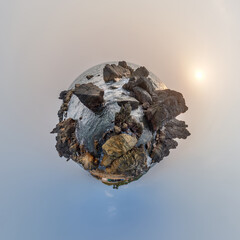 simple little tiny planet without buildings in blue sky with sun and beautiful clouds....