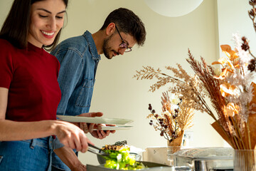 Colleagues enjoying healthy food options at a workplace buffet, fostering camaraderie and team building during a company lunch break