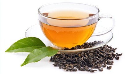 Fototapeta premium A cup of tea with tea leaves and a green sprig.