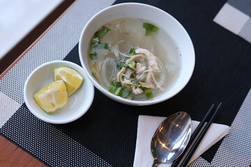 Delicious fried narrow-barred Spanish mackerel fish fillet with rice and noodles in thick soup in Tainan, Taiwan.