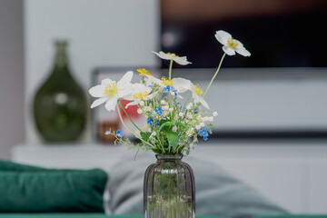 Delicate floral arrangement in a glass vase