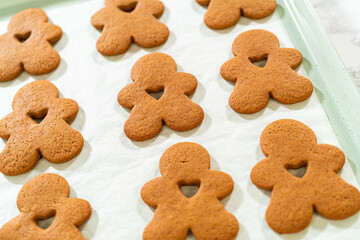 Preparing and Baking Classic Gingerbread Cookies in Gingerbread Man Shapes