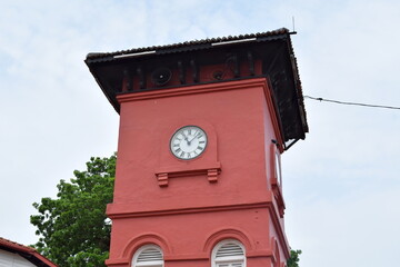 Red clock tower at Dutch Square in Malacca, Malaysia