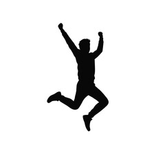 Silhouette of a man celebrating a victory with arms raised and jumping in excitement