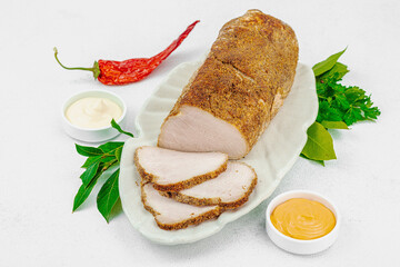 High-protein roasted pork loin served with tasty sauces, styled for food photography