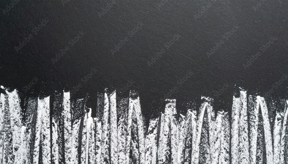 Poster creating textured art using white powder on black canvas studio visual art controlled environment to