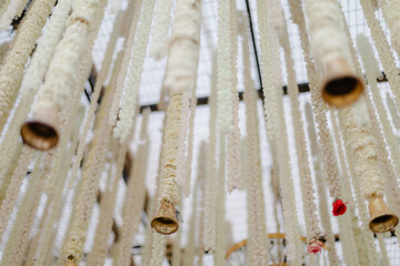 Floral Wedding Decor: Cascading garlands and delicate bells create a romantic ambiance for a celebration, perfect for photos and creating memories.