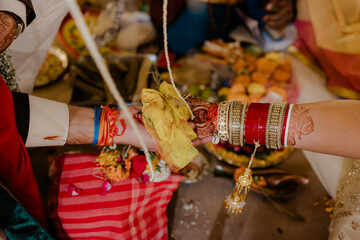 Hands joined in sacred union. An auspicious beginning to a lifetime of love and commitment, bound...