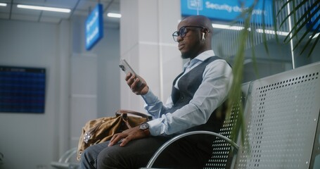 International Airport Terminal: Successful Entrepreneur Using Phone, Sending e-Commerce Emails....