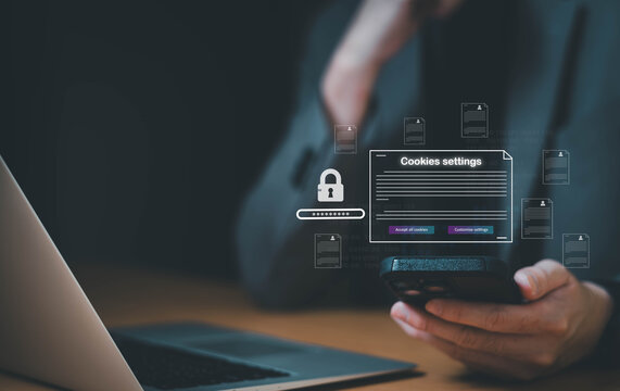 hand using laptop while choose to accept internet cookies policy or reject. Customer data privacy concept that allow web browser to collect user data to resell or use for marketing purpose