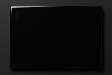 blank black glossy ceramic tile on white background