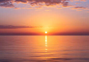 Naklejka premium Sunrise over calm ocean